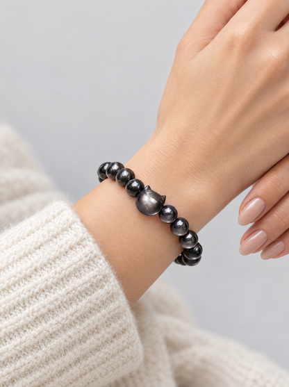 La Luna Obsidian Bracelet worn on a woman's wrist