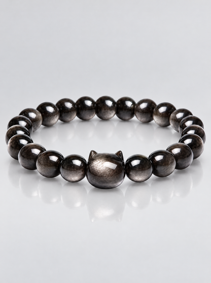 La Luna Obsidian Bracelet with silver-sheen obsidian beads and carved cat-head centrepiece